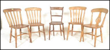 A harlequin set of 5 Victorian 19th century beech and elm dining chairs. To include Windsor style