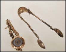 A vintage early 20th Century 9ct gold Art Deco cocktail watch along with a pair of Victorian