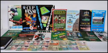 A collection of FA Cup football programmes having their tickets to include matches between Everton v
