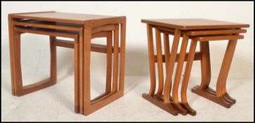 Two 20th Century retro vintage teak nest of three nesting coffee tables comprising a Parker Knoll
