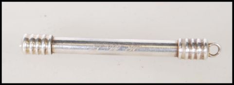 A 20th Century silver mechanical toothpick engrave