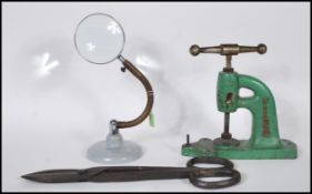 A pair of early 20th Century iron drapers haberdashery scissors of large form. Together with a