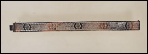 A stamped 835 silver hexagon / honeycomb link bracelet and having a tongue and groove clasp.