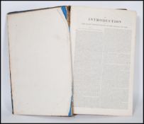 A 18th Century Georgian Bible of large form, being leather bound with gilt detailing. This is a