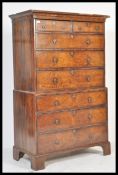 AN 18TH CENTURY GEORGE II WALNUT CHEST ON CHEST OF