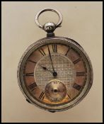 A stamped 935 continental silver open face pocket watch having a silvered dial with roman numeral