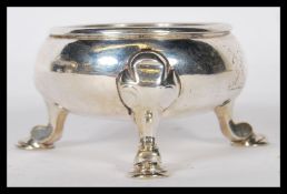 A silver hallmarked 18th century George 2nd table salt circa 1730 being believed to be by Joseph
