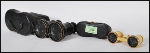 A pair of 19th Century French opera ivory glasses being brass mounted and inscribed 'Duchesse 12