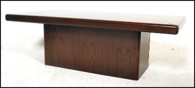 A retro 20th Century Danish teak wood pedestal coffee table, the flared top with rounded chamfered