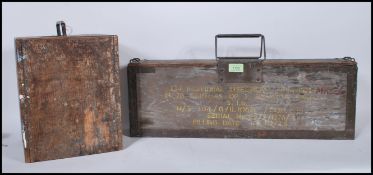 Two vintage 20th Century wooden military hinged top ammunition boxes, each with notation to cases.