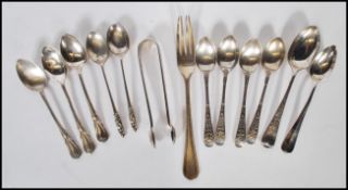 A collection of silver hallmarked flatware to include 4 Sheffield hallmarked teaspoons bt WG&S, 3