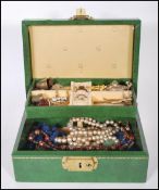 A collection of vintage 20th Century costume jewellery to include brooches, dress rings, cuff links,
