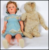 ANTIQUE TEDDY BEAR AND VINTAGE DOLL