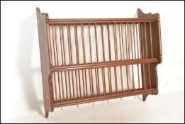 A 20th Century antique style country pine two tier slatted wall hanging plate rack. The plate rack