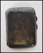 An early 20th Century silver hallmarked cheroot / cigarette case, engine turned design, Birmingham