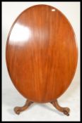 A 19th century High Victorian walnut tilt top brea