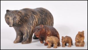 A collection of five carved Black Forest treen bea