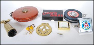 A group of 20th Century mixed collectables to include two large tape measure one made by Rabone