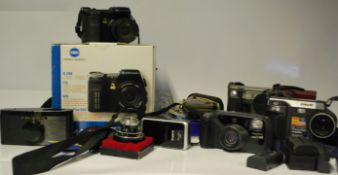 A collection of vintage 35mm cameras, lenses  and accessories together with digital cameras, some