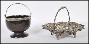 A 20th century white metal and silver bon bon dish with grape and vine embellished decoration having