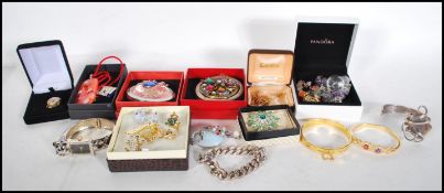 A collection of contemporary costume jewellery to include a selection of agate bracelets, a group of