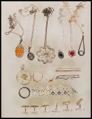 A collection of silver jewellery,  to include a selection of pendant necklaces including a