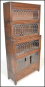 A 19th century believed Globe Wernicke leaded glass 4 section lawyers / barristers cabinet raised on
