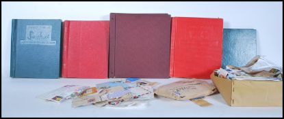 A collection of stamps dating from the 19th Century set within five albums, stamps from all around