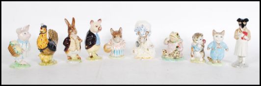 A collection of eleven Beswick ceramic Beatrice Potter figurines to include Mr Benjamin Bunny, Tom