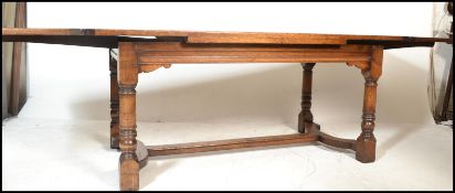 An excellent solid oak monastic refectory dining table in the Jacobean manner of long, large form.