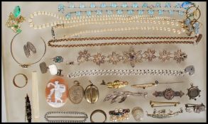 A collection of vintage jewellery to include, a Victorian sweetheart brooch decorated with gold