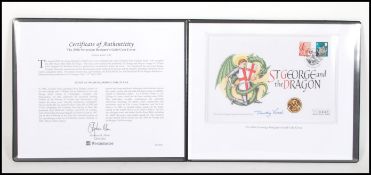 A 2006 Westminster 22ct gold sovereign designer's gold coin cover, edition limit 500 celebrating