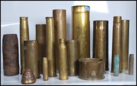 A collection of vintage 20th Century conflicts post second World War trench art modelled from