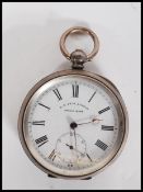 An early 20th century silver cased pocket watch by Henry E Peck Swiss made. The white enamel face