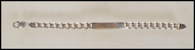 A silver 925 flat belcher link bracelet chain with name / monogram bar united by lobster clasp.