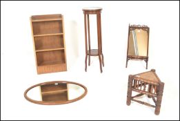 An Edwardian mahogany plant stand torchere with circular tier together with on oak turners stool