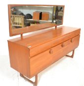 A vintage mid 20th Century teak wood dressing table sideboard having three cupboard with circular