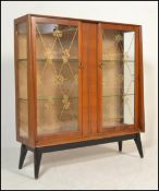 A mid 20th Century walnut glazed display / china cabinet. Full length twin glazed doors with