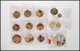 A small collection commemorative coins to include two Diamond Jubilee, The double Leopard, Kings and