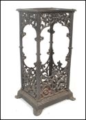 An early 20th Century cast iron ebonised stick stand of rectangular form in the manner of