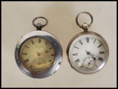 Two silver hallmarked open face pocket watches dating from the late 19th Century. Both having