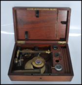 A mid-19th Century Victorian Charles Chevalier lacquered brass Compound Monocular and Simple Chest