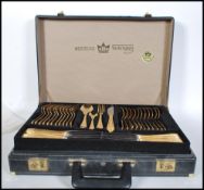 A 20th century Bestecke Solingen canteen of gold plated cutlery for twelve complete in the canteen