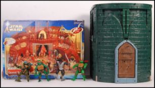 TWO VINTAGE ACTION FIGURE PLAYSETS