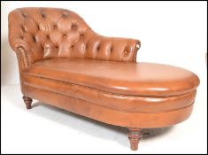 A contemporary antique revival tan brown leather button back chesterfield style chaise longue