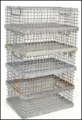 A stack of five mid century Industrial oyster / fish catchers crates. Each of metal form with grid
