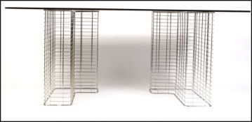 A 1980's 20th century modernist retro chrome wire and glass desk comprising of two ' L ' shaped