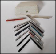 A collection of vintage writing pens to include a Waterman's ink pen, a boxed Sheaffer pen, nova