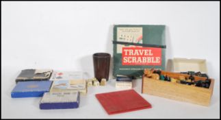 A collection of vintage 20th Century board games and card games to include a chess set, travel