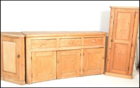 A 19th Century Victorian pine corner cupboard, one being a wall hanging cupboard with central door